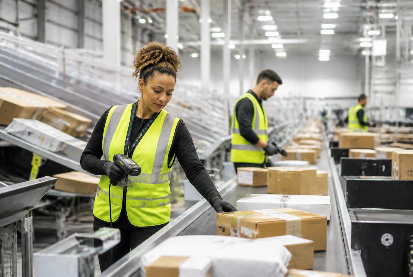 Parcels being scanned and sorted inside the Swift Vaults facility